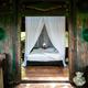 Illustration for article titled Built almost entirely of bamboo, this is one of the worlds most sustainable and spiritual hotels
